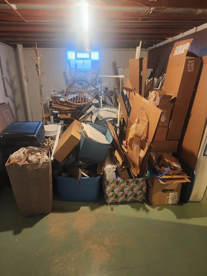 Roll-off dumpster container at job site for 2 Yard Dumpster Rental in Middleton